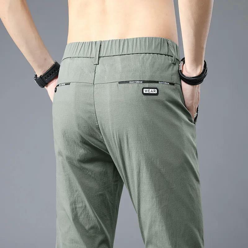 Pantalones de cintura media para hombre, ropa informal Coreana de Color sólido, con bolsillos empalmados