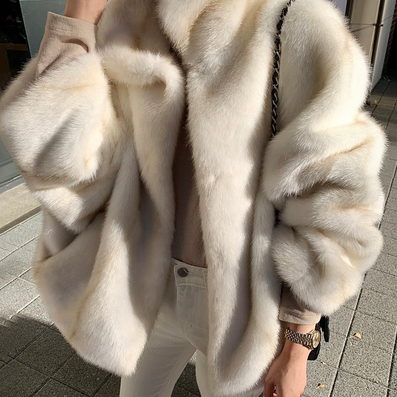 Koreańska jesienna i zimowa modna kurtka damska 2024 Temperament elegancka klapa z luźne kieszenie szczelinami ciepła imitacja futra z norek