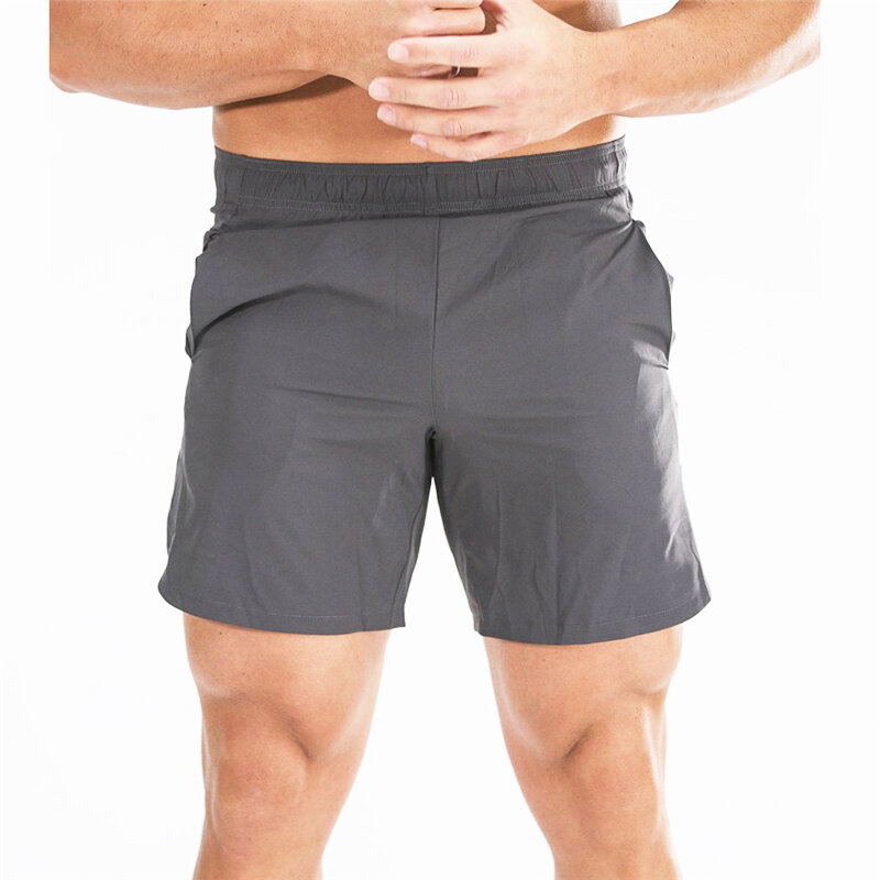 Celana pendek pria, celana pendek Solid cepat kering pakaian olahraga Gym latihan lari musim panas