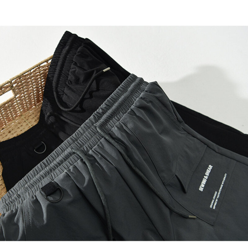 Pantalones cortos informales para hombre, ropa masculina holgada de retales con cordón, bolsillos grandes, AZ840-1, novedad de verano 2024