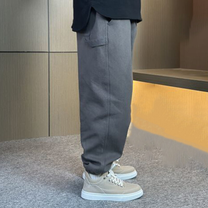 2023 moda masculina solto design fino calças casuais cor sólida beamed calças estilo americano harem calças de rua esportes macacão