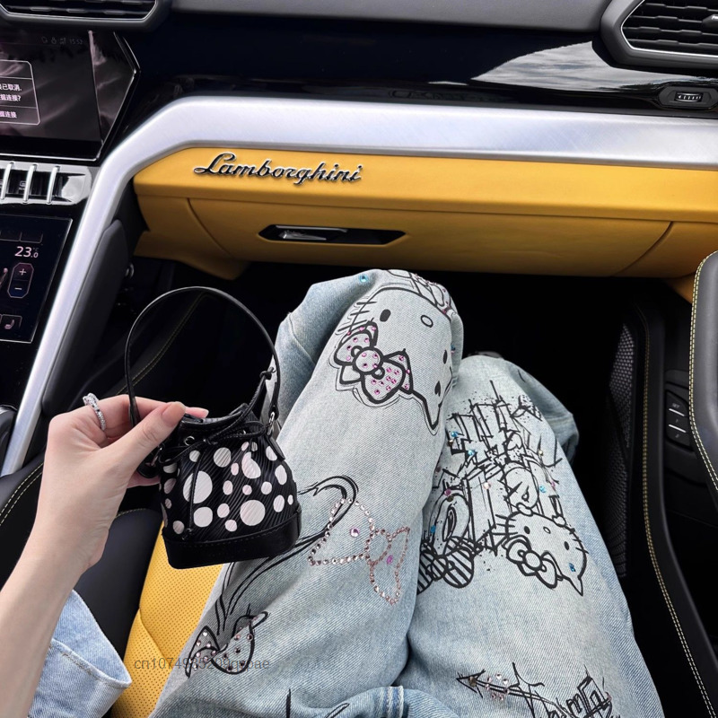 Sanrio najnowsza diamentowa Hello Kitty Graffiti damskie dżinsy amerykańskie główna ulica Y2k dziewczęce spodnie jeansowe nowe luźne spodnie z szerokimi nogawkami