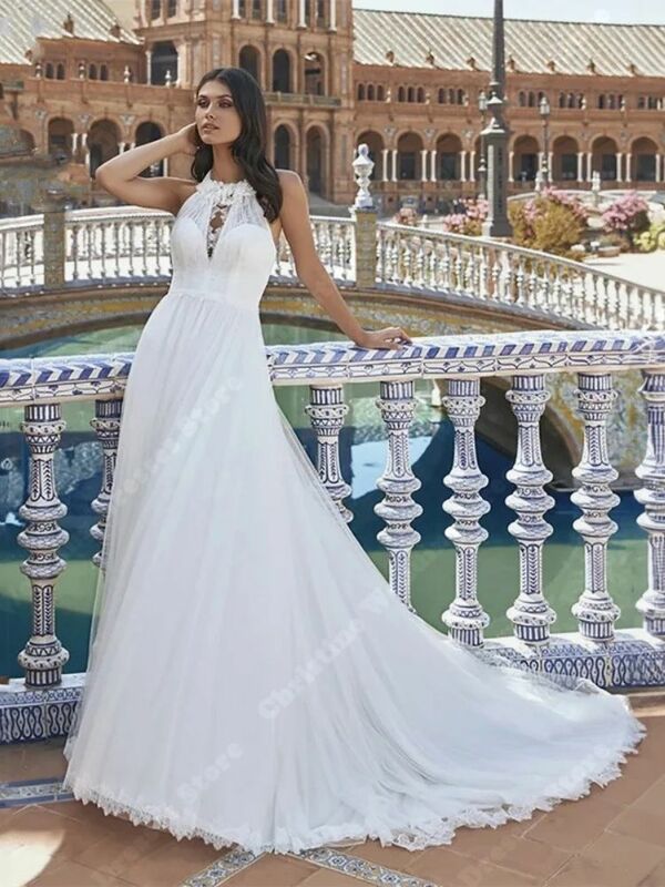 Suknie ślubne w stylu Vintage bez rękawów jasnym kolorze przezroczysty, tiulowy powierzchniowe suknie ślubne z koronkowymi aplikacjami szaty Vestidos De Novia