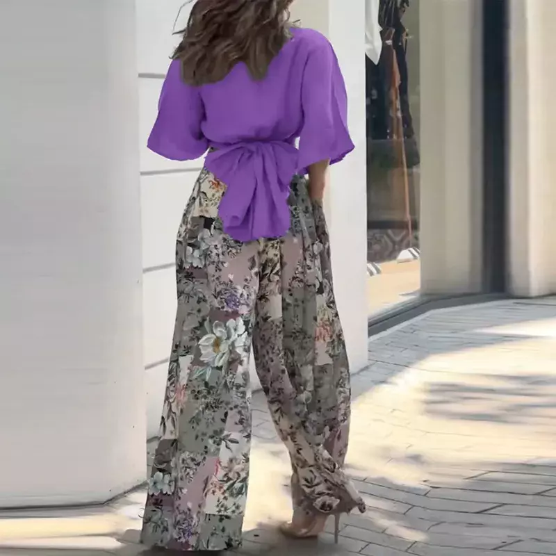 Elegancki kwiatowy nadruk dwuczęściowe stroje Sexy Lady Twist wiązany pas topy koszula i plisowane spodnie zestaw 2023 kobiet pół rękaw luźny kombinezon