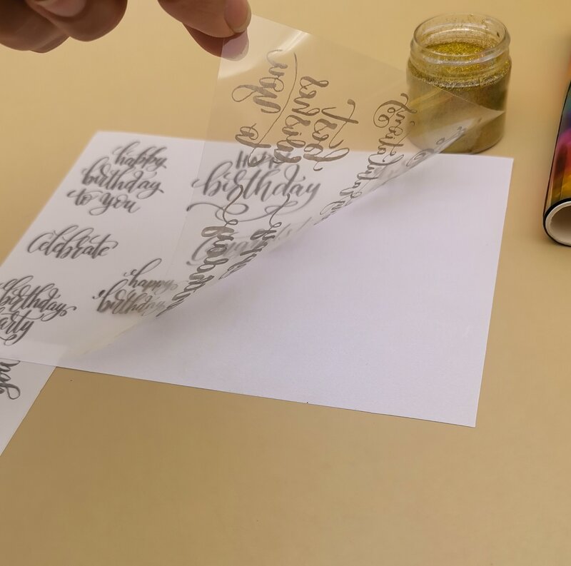การปรับแต่งแผ่นสติกเกอร์กระดาษถ่ายโอนกระดาษฟอยล์ลายนูนผงเพิ่มแผ่นกระดาษกลิตเตอร์