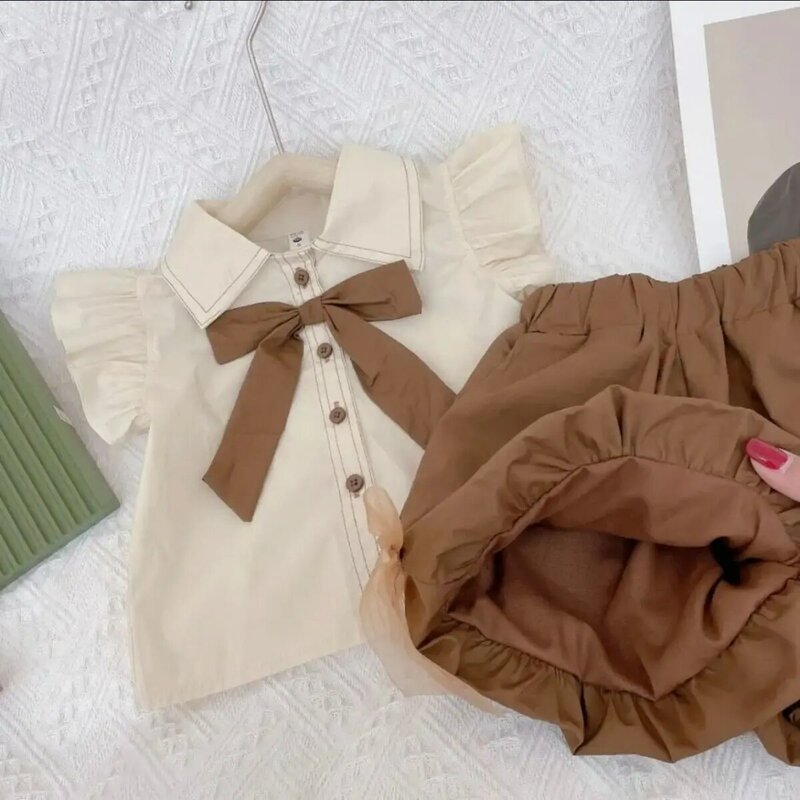 Conjunto de camisa de manga corta para niñas pequeñas, conjunto de ropa de dos piezas con solapa, pantalones cortos, novedad de verano 2023