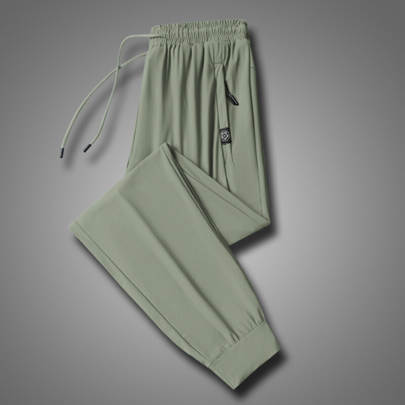 Pantalones de hielo de seda para hombre, Pantalón deportivo ultrafino de secado rápido, holgado, elástico, con cremallera y bolsillo, para trotar