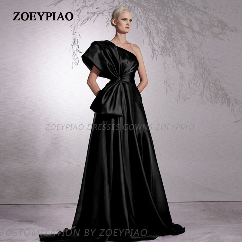 サテンのイブニングドレス,非対称の裸の肩,黒いフロントボウ,フォーマルなラインドレス,床の長さのガウン,プロムパーティー