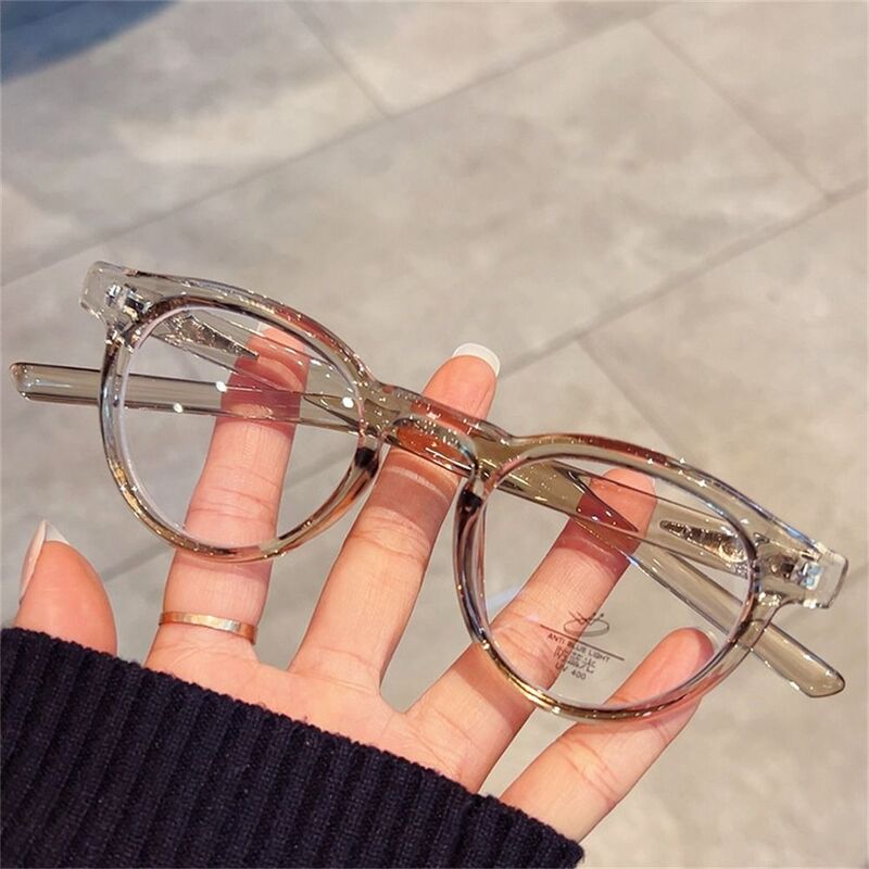 Occhiali con montatura in metallo con montatura rotonda occhiali da vista per miopia per PC ultraleggeri retrò occhiali da vista per la cura della vista donna uomo