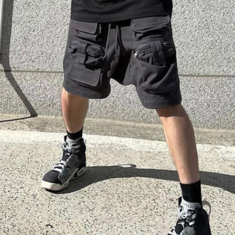 Firmranch nowa koreańska moda Retro główna ulica spodenki luźne w stylu Casual dla mężczyzn elastyczna talia letnia spodnie the Fifth taktyki z wieloma kieszeniami