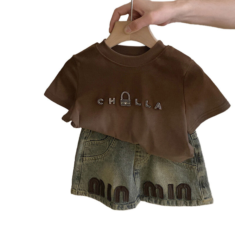 Koreańska wersja dziecięcej letniej sukienki nowy dziewczęcy garnitur dla dzieci zagraniczne litery t-shirt z krótkim rękawem jeansowa spódniczka tide90-140cm