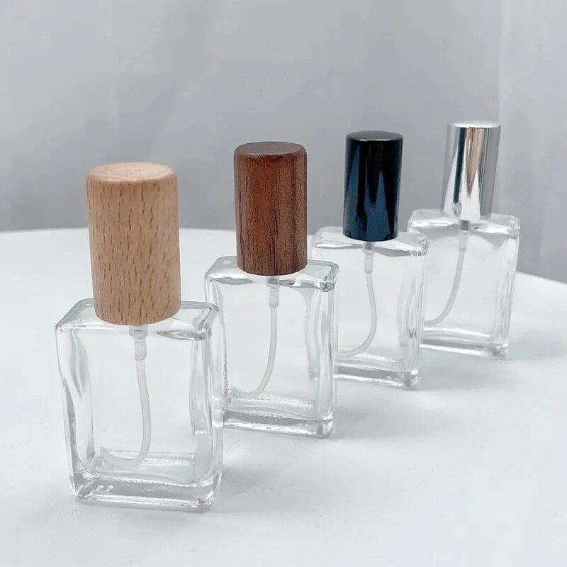 Mini botella de Perfume cuadrada de 15 ml, viales de muestra cosméticos de vidrio, cubierta de haya, bomba de prensa, atomizador de pulverización rellenable vacío, tapa de madera