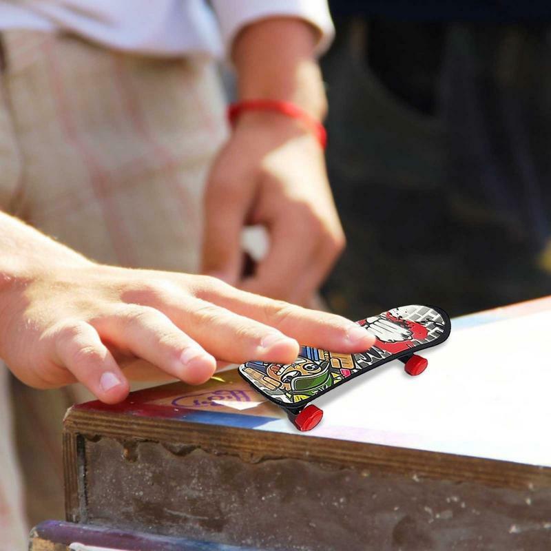 สเก็ตบอร์ดนิ้วมือสำหรับเด็กตลกนิ้วมือสเก็ตบอร์ดสำหรับเด็ก Mini Finger Skateboard สเก็ตบอร์ดของเล่นของเล่นนิ้วมือชุดสเก็ต Board