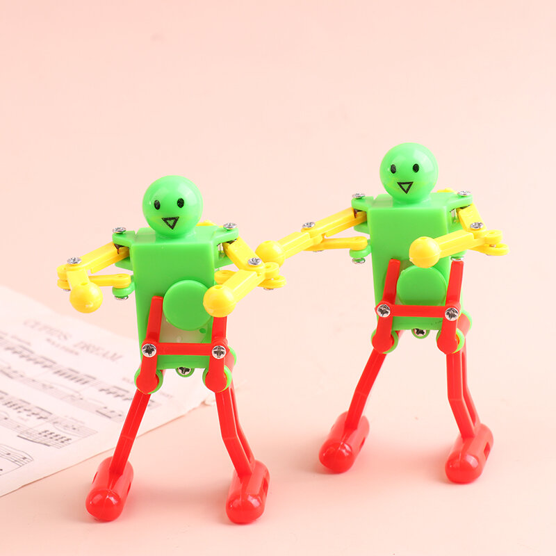 Mechaniczna nakręcana zabawka tańczący Robot na prezent dla dzieci Puzzle nakręcana zabawka zabawka spinner