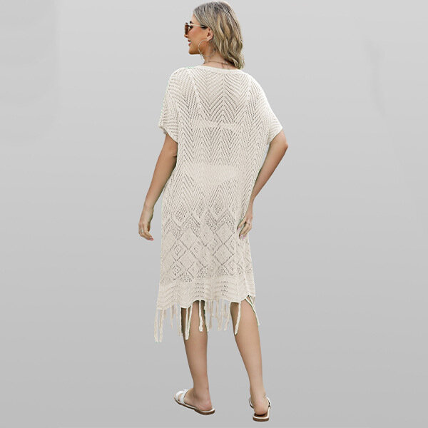 Wysokiej jakości 2024 Summer Hot Selling Solid Color Hollowed Out V-neck Loose Oversized Fringe Beach Skirt Maxi Dresses for Women
