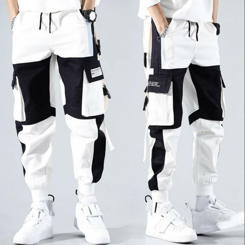 Męskie spodnie bojówki męski Hip Hop spodnie Cargo w stylu Streetwear z wiele kieszeni klamrą luźny krój głębokie spodnie w kroczu dla ciepła