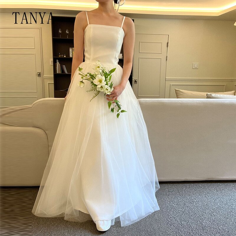 Simple Spaghetti Straps Tulle Wedding Dress Sleeveless A Line Floor Length Bridal Dress Lace Up Back Customized Bridal Gown