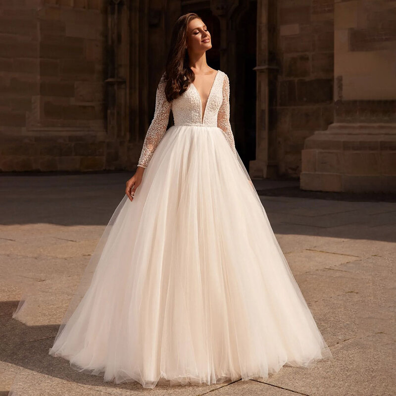 Luksusowa suknia ślubna z długim rękawem i koralikami dla kobiet Suknia ślubna z tiulu bez pleców vestido de novia