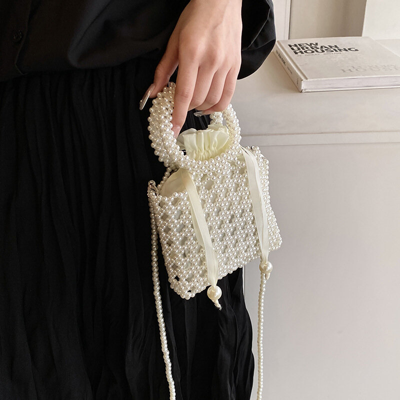 Borsa estiva da donna 2024 nuova piccola borsa di perle moda borsa da spiaggia a tracolla cava borse e borsette