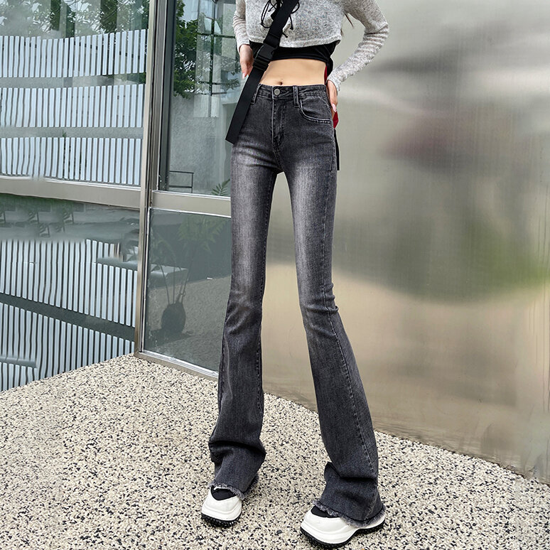 Jeans a vita alta micro flare primavera femminile nuovo design di tela da imballaggio versatile elastico stretto sottile pantaloni a ferro di cavallo marea