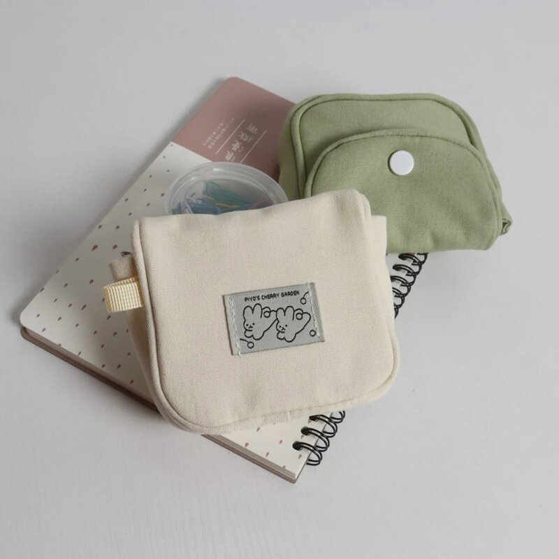 กระเป๋าใส่เงินขนาดเล็กสีทึบใหม่ dompet koin พกพาได้กระเป๋าใส่หูฟังผ้าฝ้ายน้ำหนักเบากระเป๋าใส่กุญแจกระเป๋าเก็บบัตรเดินทาง