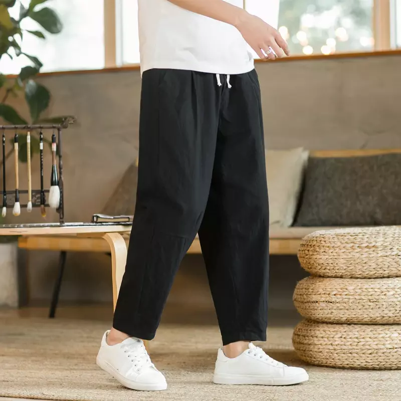 Celana panjang pria katun Linen, celana kasual warna Solid bersirkulasi udara longgar celana pendek serut lurus untuk pria