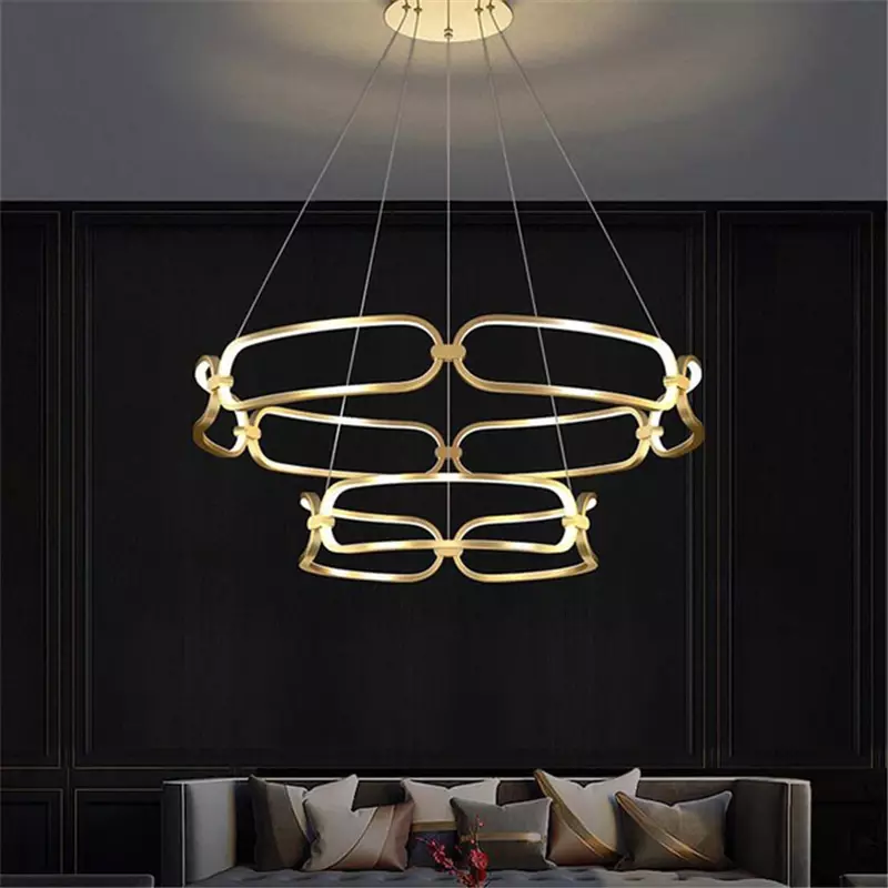 Gli anelli dorati moderni hanno condotto l'illuminazione del candeliere del soffitto per le luci d'attaccatura di lustri del salone che illuminano la decorazione della stanza di illuminazione principale