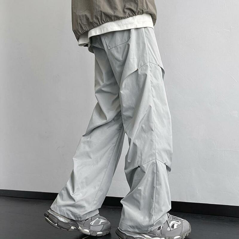 Pantaloni a gamba dritta da uomo eleganti pantaloni Cargo Unisex con decorazione rivettata ampia vestibilità ampia Design impermeabile per Streetwear o Outdoor