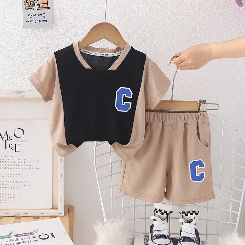 Nowe letnie ubrania dla chłopców odzież niemowlęca dzieci t-shirt szorty 2 sztuk/zestaw dla niemowląt strój sportowy dla dzieci odzież sportowa