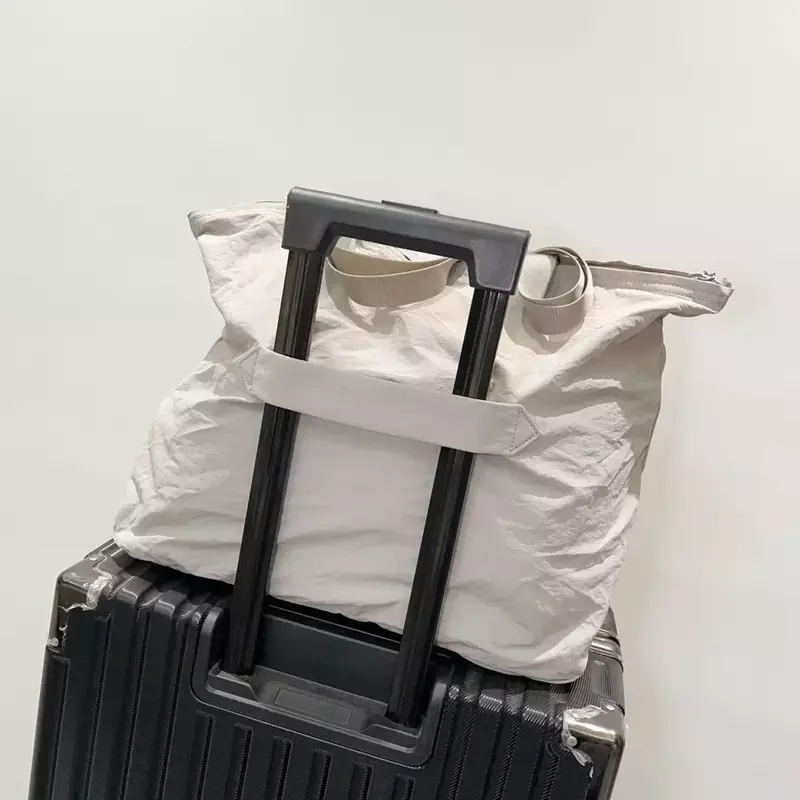 LuluLogo-Grand sac fourre-tout pliable, sac à main portable, sac de rangement à la main, décontracté, grande capacité, sac à main étanche, sacs initiés au voyage, 30L