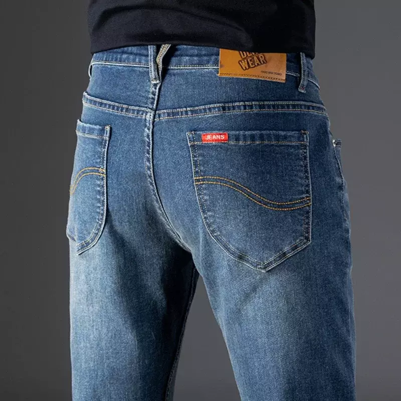 Wiosenny i jesienny nowy moda biznesowy do jeansów mężczyzn prosto Slim wszystkie dopasowane luźne spodnie typu Casual markowe spodnie