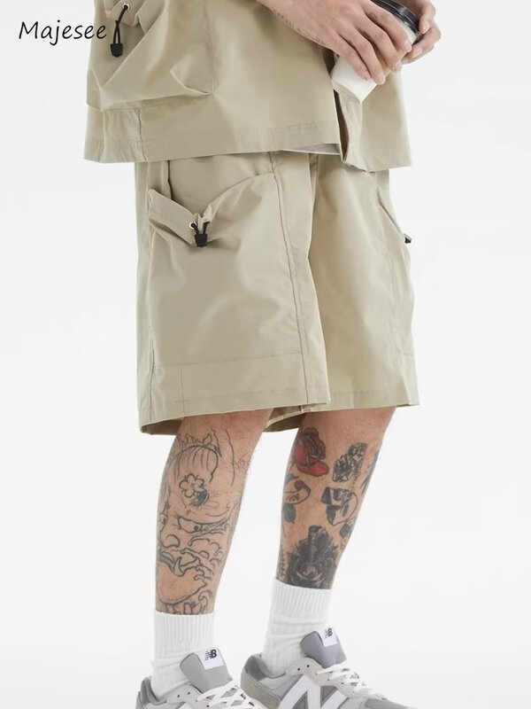 Lässige Shorts Männer verlieren täglich große Tasche Sommer elastische Taille All-Match japanischen Stil männliche Streetwear einfache Mode solide