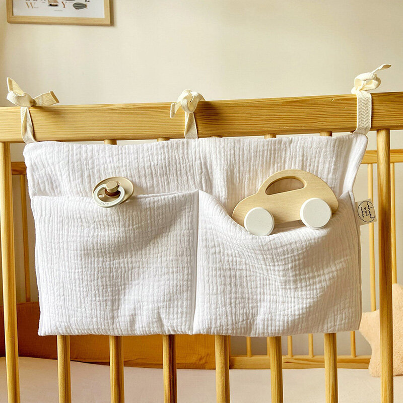 Bolsa de almacenamiento para cuna de bebé, organizador multiusos de algodón puro con doble bolsillo para colgar pañales y pañuelos, soporte para juguetes