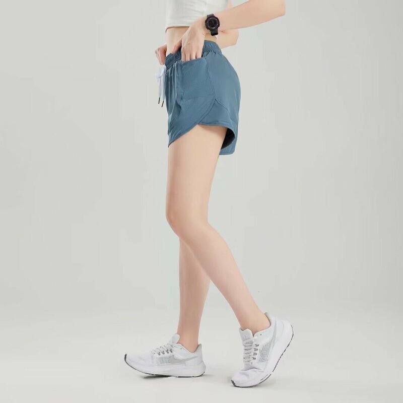 Damskie spodenki sportowe pasek damski podszyte anty-rozcięcie siateczka z kieszonkowymi spodniami do biegania szorty Fitness spodniami do jogi