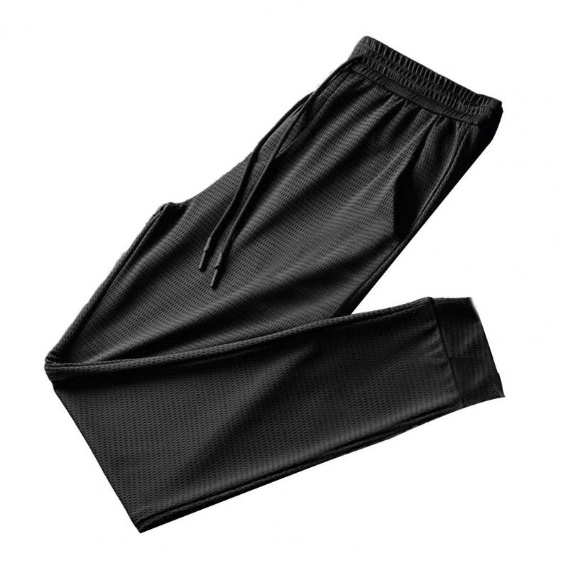 Pantalones deportivos de talla grande para hombre, pantalones de malla de seda de hielo con estampado de plumas y cordón, de verano, de secado rápido con bolsillos