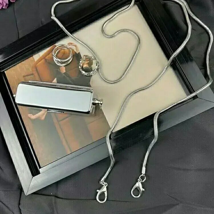 MINI bolso de lápiz labial de estilo metálico, cadenas de acero inoxidable, monedero con broche de moda, estilo euroamericano