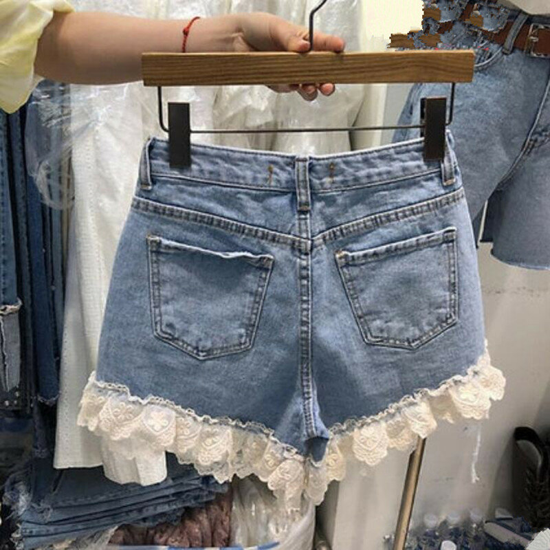 Pantaloncini di jeans con cuciture in pizzo donna estate nuova moda buco personalità vita alta pantaloncini gamba larga Plus Size s232