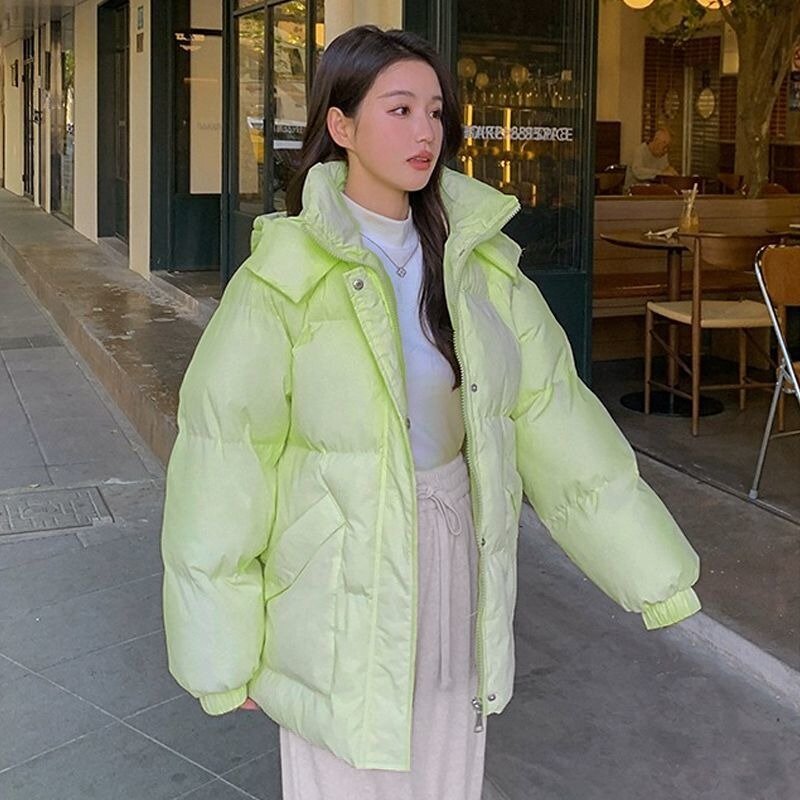 Abrigo de plumón de algodón para mujer, chaqueta de longitud media, Parkas holgadas y gruesas con capucha, abrigo versátil para invierno, novedad de 2023