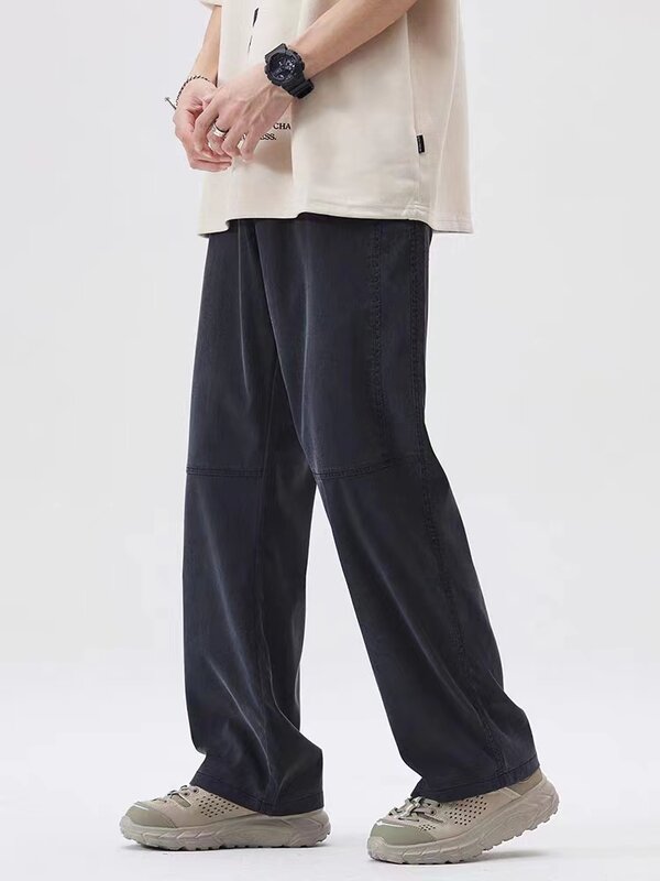 Letnie jasne i cienkie męskie spodnie proste luźne spodnie dresowe miękkiej tkaniny Lyocell męża domu na co dzień szerokie nogawki długie luźne spodnie