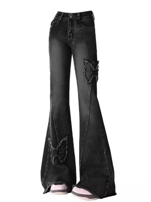 Женские свободные джинсы-клеш с заниженной талией и необработанными краями
