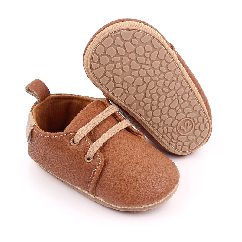 Sepatu bayi laki-laki dan perempuan, sneaker kulit Pu anti slip sol karet untuk Orok baru lahir