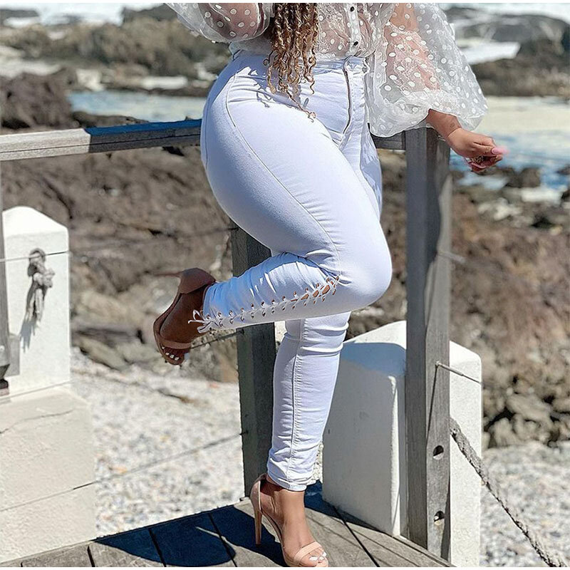 Plus rozmiar Sexy drążą białe obcisłe dżinsy rurki 3XL lato Streetwear kobiety wysokiej talii zgrywanie wiązana bandażowa spodnie jeansowe ołówkowe