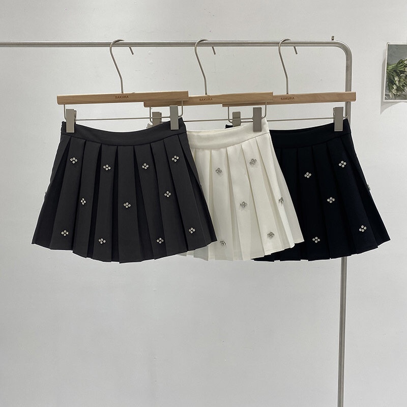 2024 Frühling Minirock Harajuku Frauen Diamant Einstellung A-Linie Damen bekleidung Baumwolle hohe Taille Mode Röcke schlank