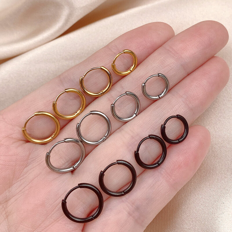 男性と女性のためのステンレス鋼のイヤリング,小さなイヤリング,1.6mm,チューブ,ヘリックス,鼻リング付き