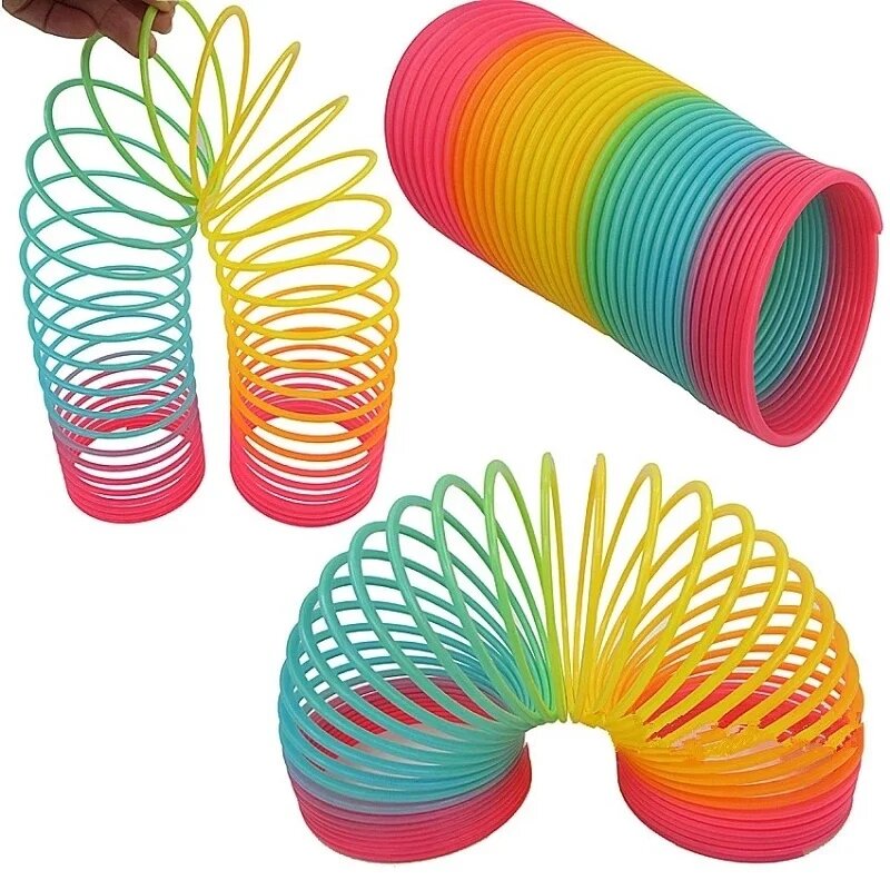 Juguetes mágicos divertidos de Color arcoíris para niños, bobina de resorte de plástico plegable para el desarrollo temprano, juguetes mágicos creativos para niños