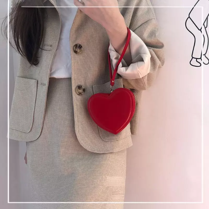 Mini monederos con forma de corazón rojo para mujer, monedero de moda, bolso de pulsera largo, estuche de compras, bolso de mano de cuero