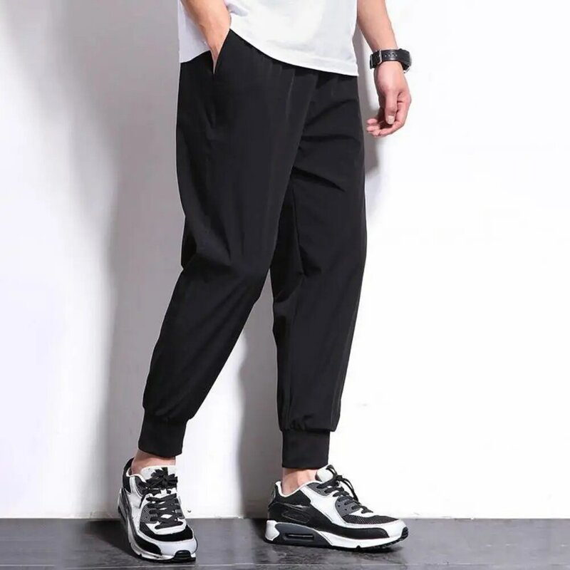 Pantalones deportivos versátiles de fibra de poliéster para hombre, pantalones cómodos transpirables con estilo para un estilo de vida activo