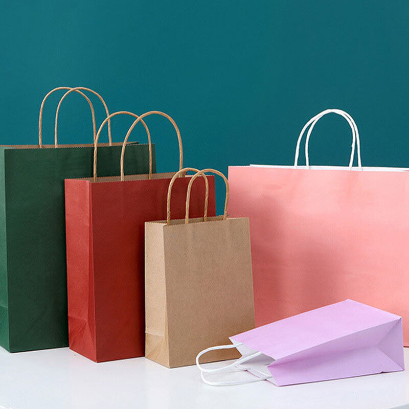 Berbagai penggunaan tas kertas Kraft Goodie pesta dan acara tas kertas tersedia warna dengan pegangan