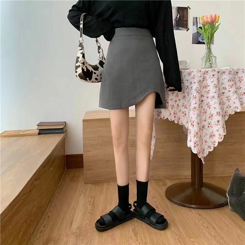 Rok A-line tidak beraturan untuk wanita, rok pendek hitam trendi pinggang tinggi pembungkus pinggul pelangsing serbaguna baru musim semi