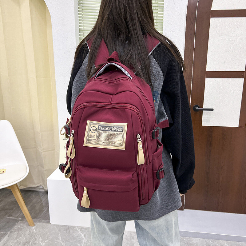 Mochila de escuela secundaria de gran capacidad para hombres y mujeres, mochila de ocio de viaje, versión coreana de bolsa de computadora para estudiantes universitarios, nueva